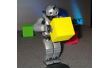 QRIOが積み上げるブロック（色）の順番にしたがって、ブロックを持ち運ぶの画像