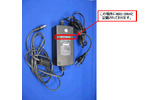 AC電源アダプタ(NBG-299A)の装置外観およびシール貼付位置の画像