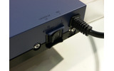 Interop Tokyo 2008のヤマハと住商情報システムのブースでは、3.5G携帯電話を回線に利用できる拠点間ルータ「G1」を展示している。の画像