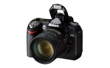ニコンは、一眼レフデジタルカメラ「D70s」を4月27日に発売すると発表した。D70sは、「D70」のマイナーバージョンアップモデル。価格はオープンプライスだが、同社によるとボディー単体は10万円前後で販売されるという。の画像