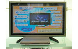 [ビジネスシヨウ2003]STBはレンタル？買い取り？FTTH映像配信のビジネスモデルを模索するKDDIの画像