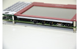 SandgateMID側面。向かって左奥にSDカードスロットが見える。WM9713LによるCODECを内蔵したオーディオ入出力ポート(スピーカ、マイク、ヘッドフォン)も内蔵の画像