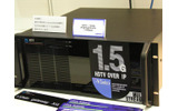 幕張メッセを会場に開催中のInterop Tokyo 2005では、6月8日から展示会場がオープンしている。そこでは、非圧縮のHDTV(高精細テレビ)映像を用いたリアルタイム・双方向のコラボレーションという実験が見られる。の画像