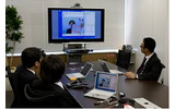 遠隔地の拠点との会議における、テレビ会議システムの利用シーン（イメージ）の画像