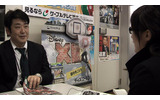 神原さん。商談テーブルの奥に見える「暴力団追放」のポスターがちょっと気になるここは足立区の画像