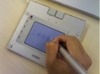 自動車保険のペーパーレス/印鑑レス契約システム——ペンタブレットでの署名を電子サイン化