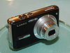 松下、手ブレ補正搭載の600万画素デジカメ「LUMIX DMC-FX9」 FX8の上位モデル