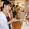 実は会場を取材するふりを必死でする私の画像