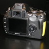 　広さおよそ40コマのニコンブースは、発売直前のデジタル一眼レフ「D40x」とコンパクトデジカメ「COOLPIX」シリーズの新モデルを大きな柱として展開していた。の画像