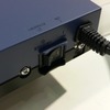 　Interop Tokyo 2008のヤマハと住商情報システムのブースでは、3.5G携帯電話を回線に利用できる拠点間ルータ「G1」を展示している。の画像