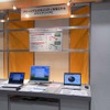 展示では、本システムを導入することによって削減できる消費電力や紙の量をアピールしているの画像