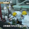 原子炉注水流量計の調整風景