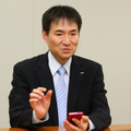 研究開発センター ネットワーク開発部 ネットワーク方式担当 担当課長 情報学博士の鈴木偉元氏