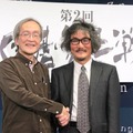 日本囲碁界を代表するトップ棋士の趙治勲名誉名人(右)と、コンピュータ囲碁ソフト「DeepZenGo」の開発者の加藤英樹氏