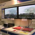 　幕張メッセを会場に開催中のInterop Tokyo 2005では、6月8日から展示会場がオープンしている。そこでは、非圧縮のHDTV（高精細テレビ）映像を用いたリアルタイム・双方向のコラボレーションという実験が見られる。