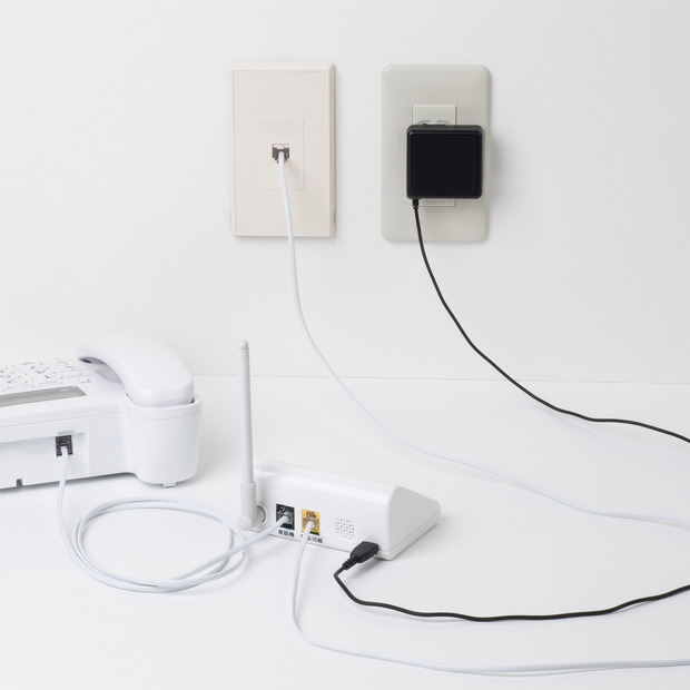 モジュラージャックと電話機本体の間に設置