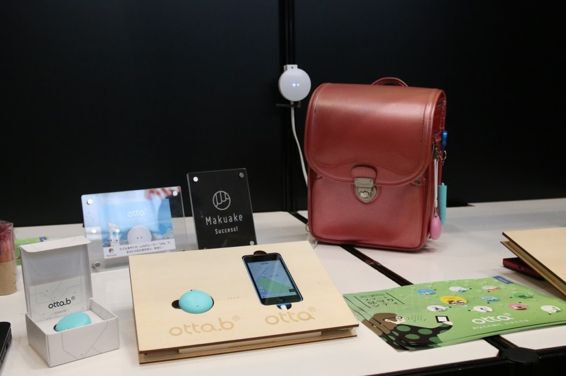「CEATEC JAPAN 2016」のottaブース。「otta」の現行サービスの紹介に加えて、今後の発売が予定される各種製品がお披露目された（撮影：防犯システム取材班）