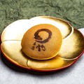 オリジナルの焼き印を刻した両口屋是清「千なり」