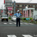 多賀城市内には、7月下旬においても信号機が復旧していない交差点が残る。交通整理を行っているのは神奈川県からの応援部隊。被災地では、普段はあまり近寄りたくない警察車両が心強く感じる