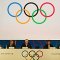 候補都市プレゼンテーション。中央はIOCのロゲ会長　(C) Getty Images