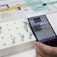 真贋判定も可能……物体指紋認証技術「GAZIRU」をNECがデモ展示 画像