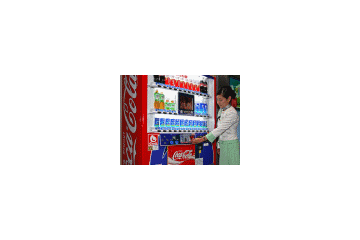 コカ・コーラの自動販売機の約20万台が、携帯電話クレジットカード「iD」に対応へ 画像