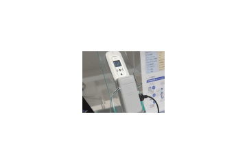 KDDIと日立、非接触ICチップ「ミューチップ」がau携帯電話で読み取れるリーダーを開発 画像