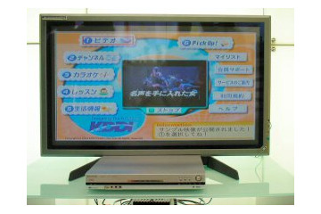 [ビジネスシヨウ2003]STBはレンタル？買い取り？FTTH映像配信のビジネスモデルを模索するKDDI 画像