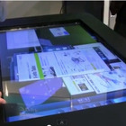 【NEC iEXPO 2011（vol.7）】超巨大！ 机一面がディスプレイの52インチタブレット「X-info Table」   画像